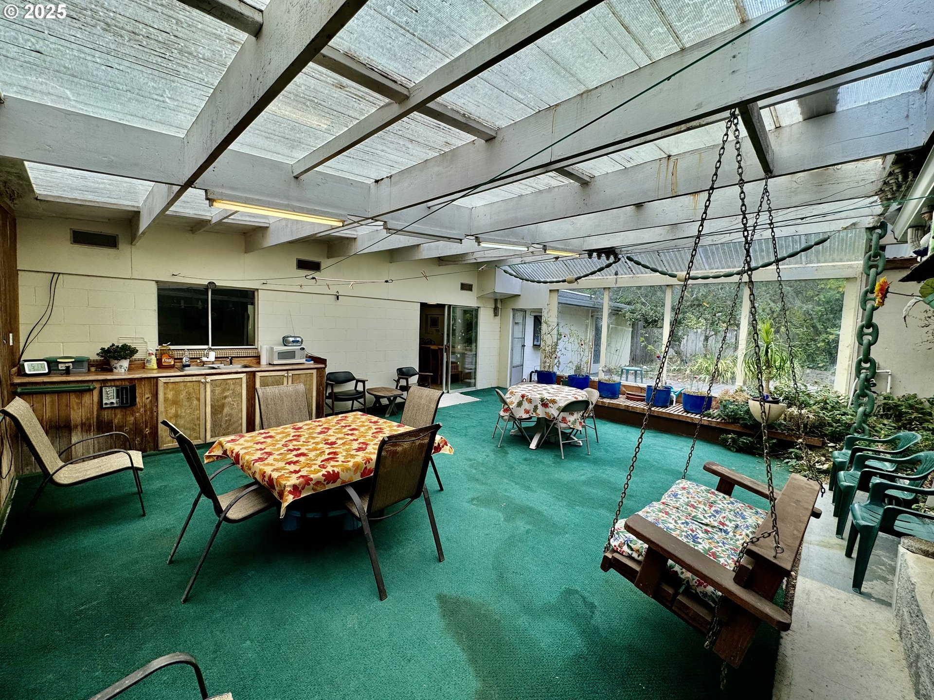 4990 Mitchell Loop Road Florence, OR 97439 - Photo 29 of 35 a outdoor space with furniture and garden