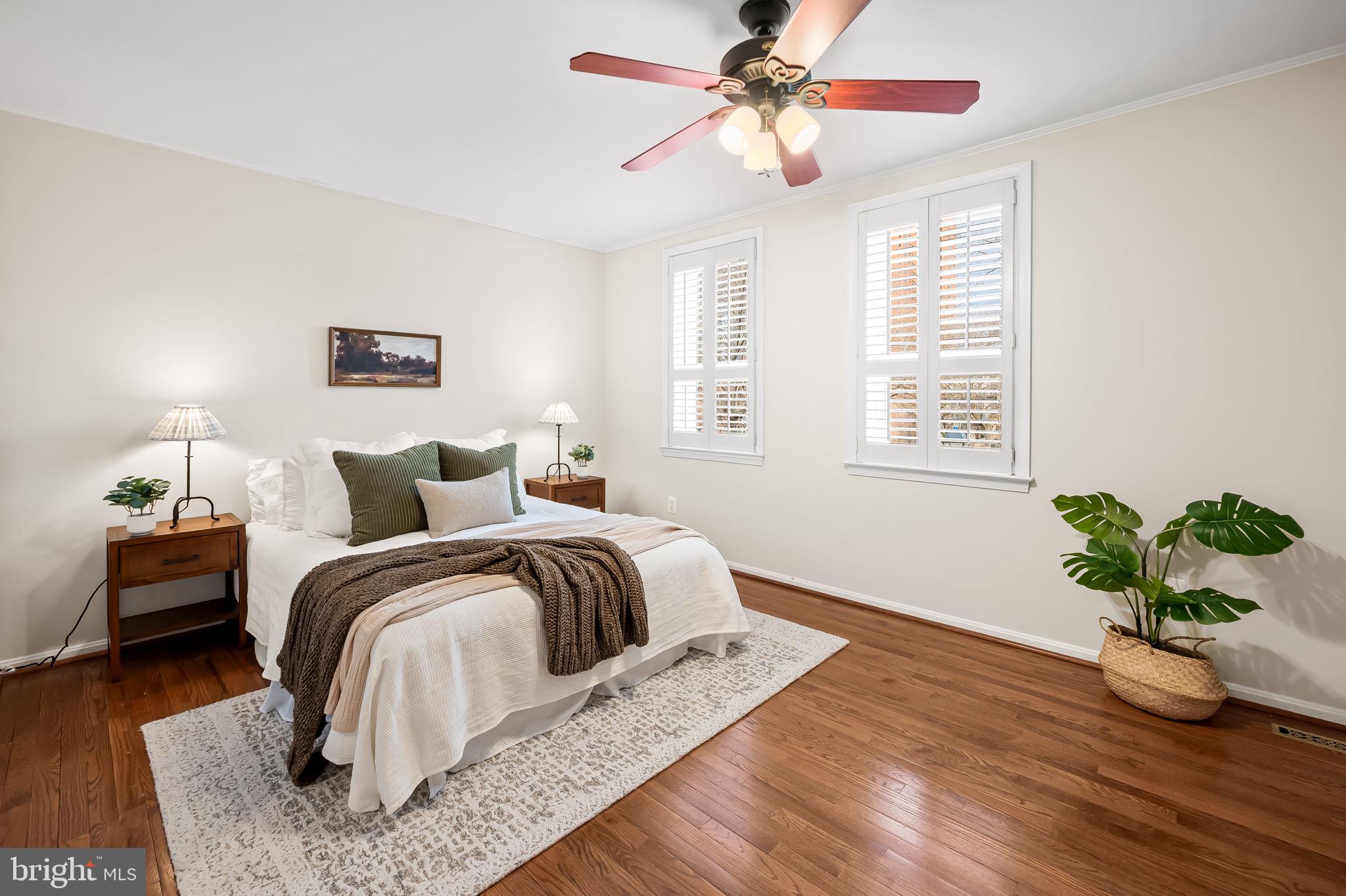 612 Pubped Way Baltimore, MD 21230 - Photo 24 of 55 a bed room with a bed and a chandelier