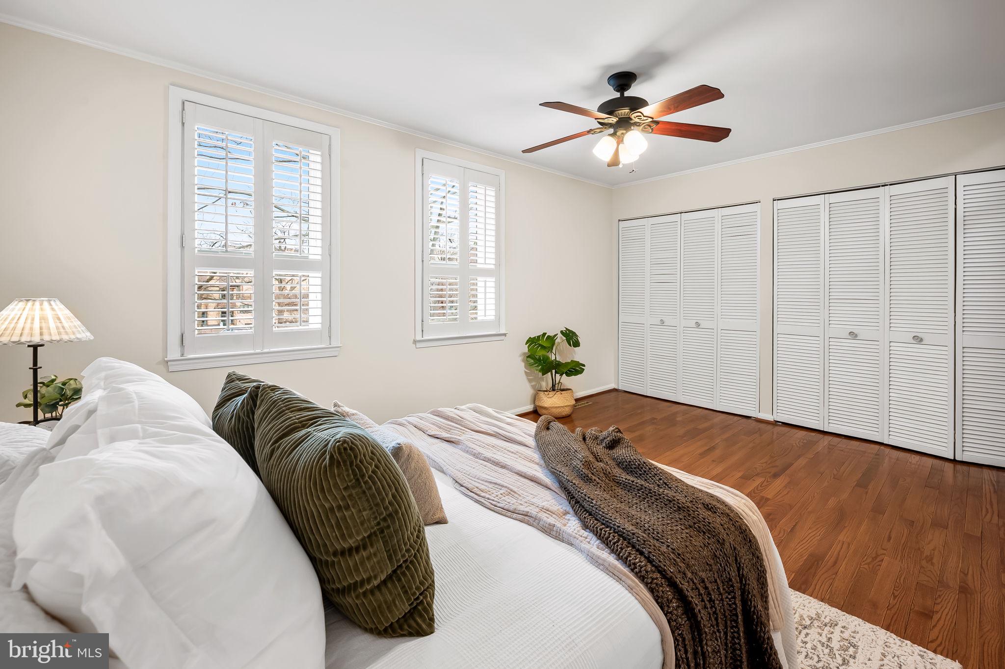 612 Pubped Way Baltimore, MD 21230 - Photo 25 of 55 a bed sitting in a bedroom next to a window and a chandelier