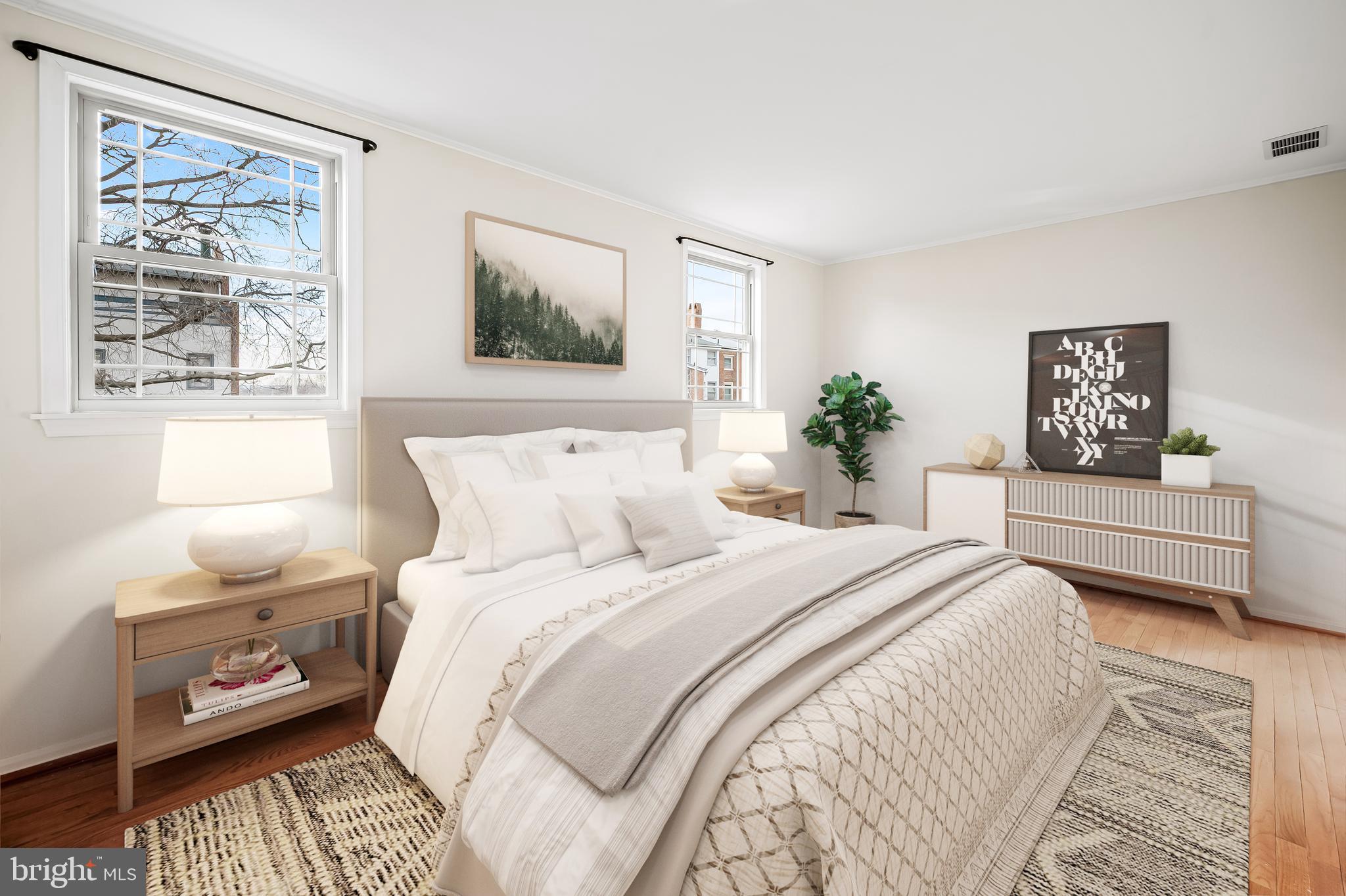 612 Pubped Way Baltimore, MD 21230 - Photo 29 of 55 a bedroom with bed and wooden floor