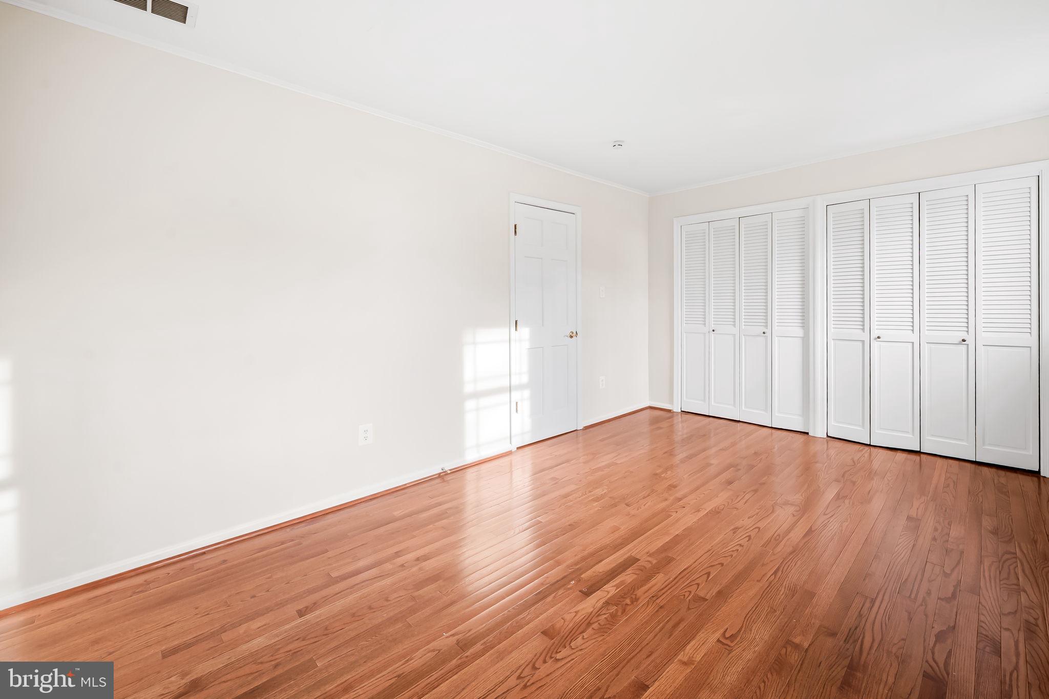 612 Pubped Way Baltimore, MD 21230 - Photo 31 of 55 a view of an empty room with wooden floor
