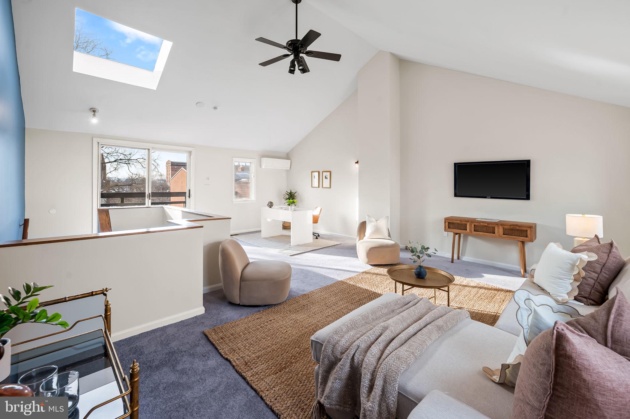 612 Pubped Way Baltimore, MD 21230 - Photo 35 of 55 a living room with furniture and a flat screen tv