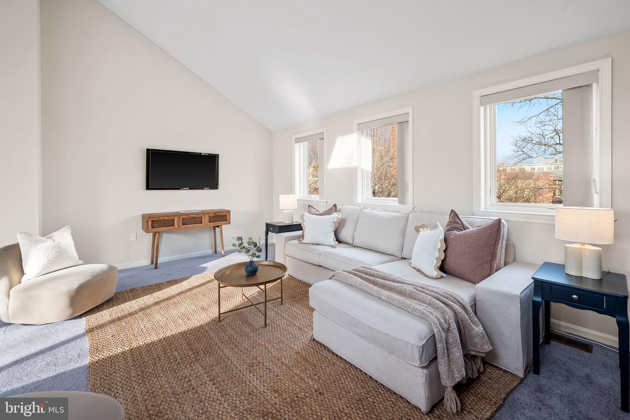 612 Pubped Way Baltimore, MD 21230 - Photo 36 of 55 a bedroom with a bed and a flat screen tv