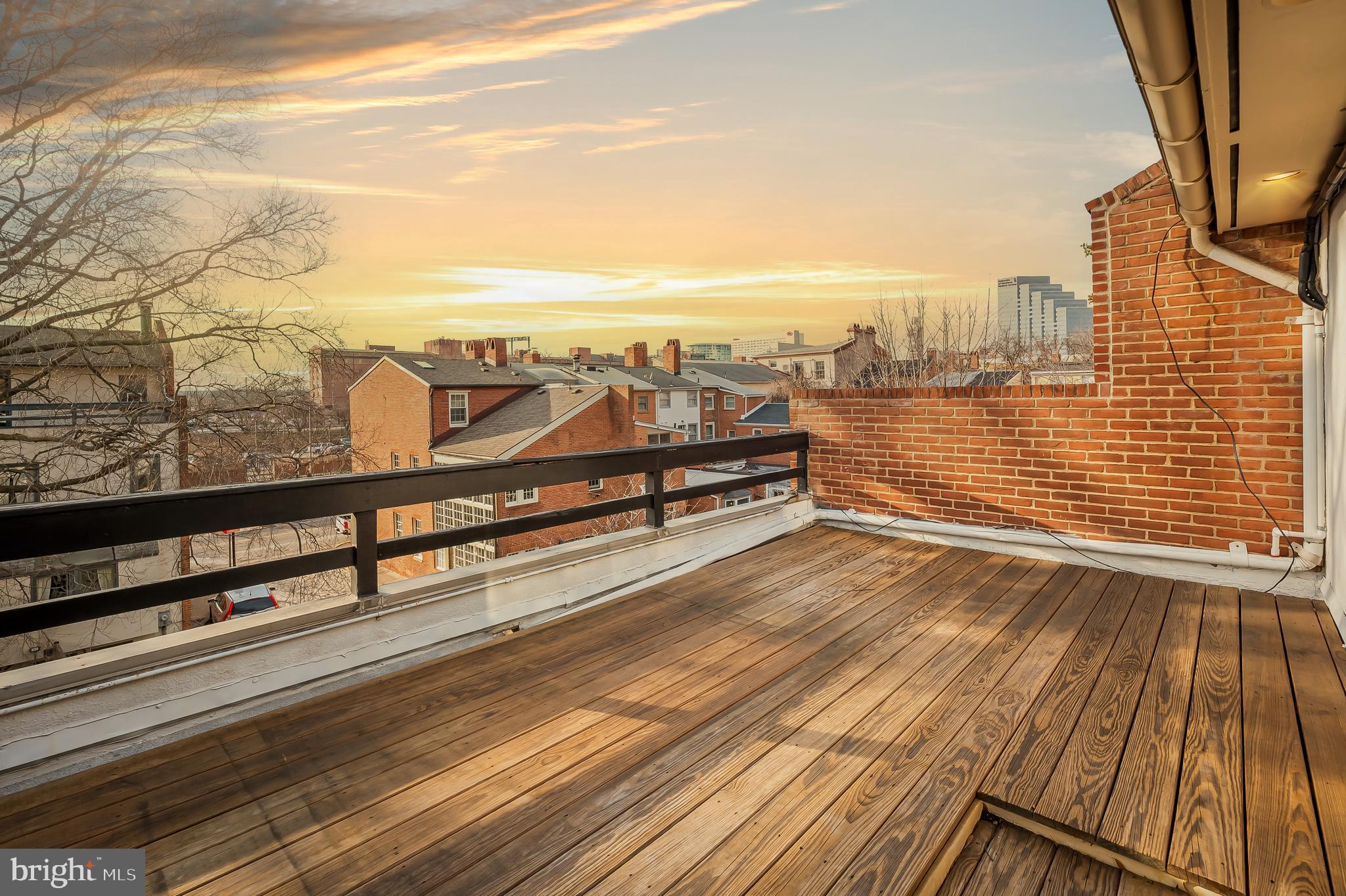 612 Pubped Way Baltimore, MD 21230 - Photo 38 of 55 a view of a terrace with wooden floor and city view