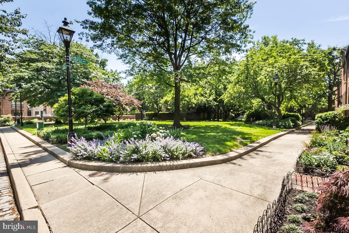 612 Pubped Way Baltimore, MD 21230 - Photo 50 of 55 a view of a swimming pool with a garden