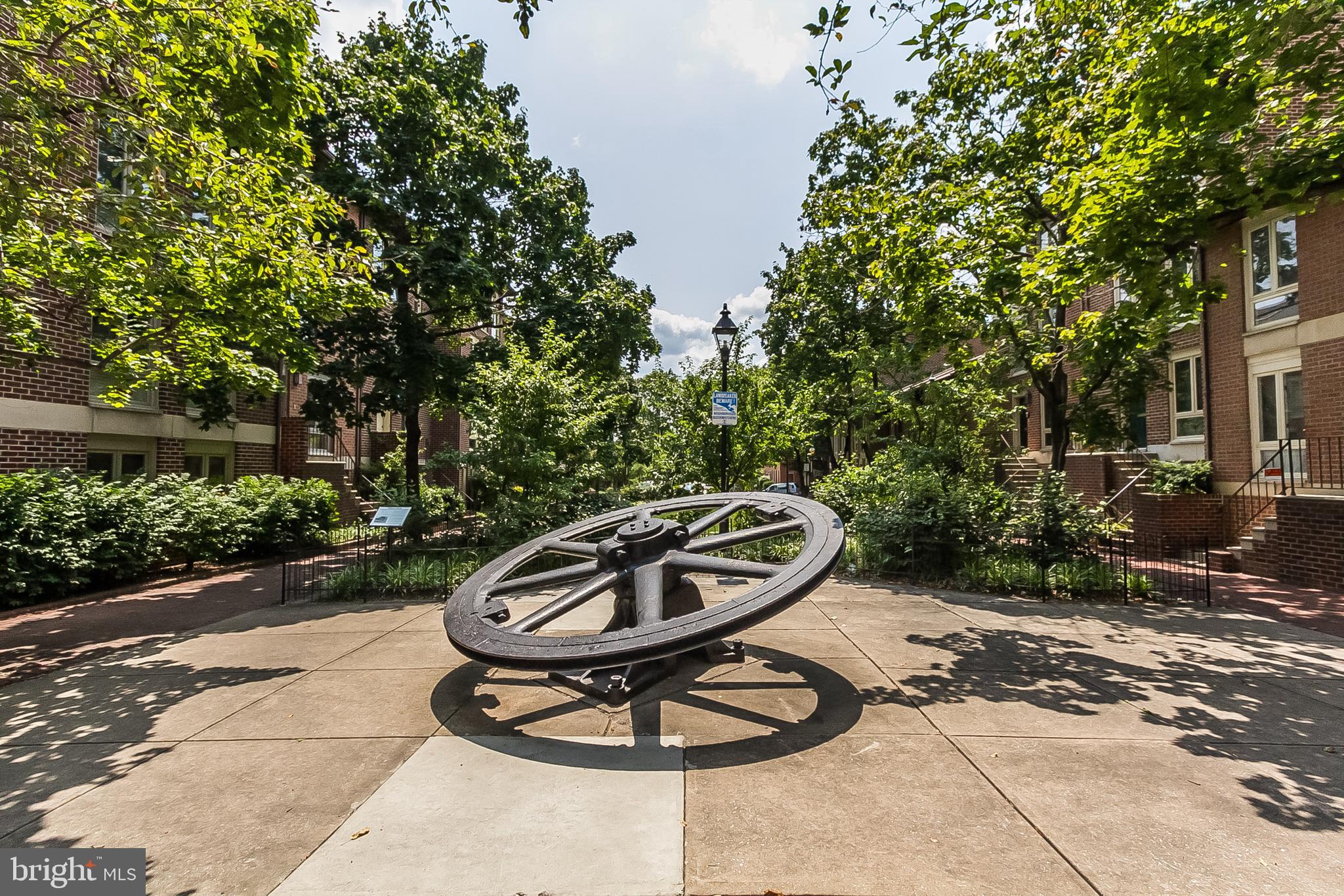 612 Pubped Way Baltimore, MD 21230 - Photo 52 of 55 a backyard of a house with fountain table and chairs