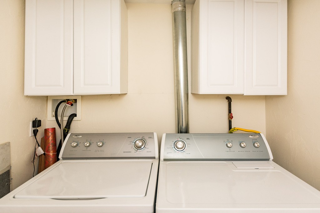 63 Oceanside Drive, Unit 63 Hull, MA 02045 - Photo 28 of 30 a utility room with dryer and washer