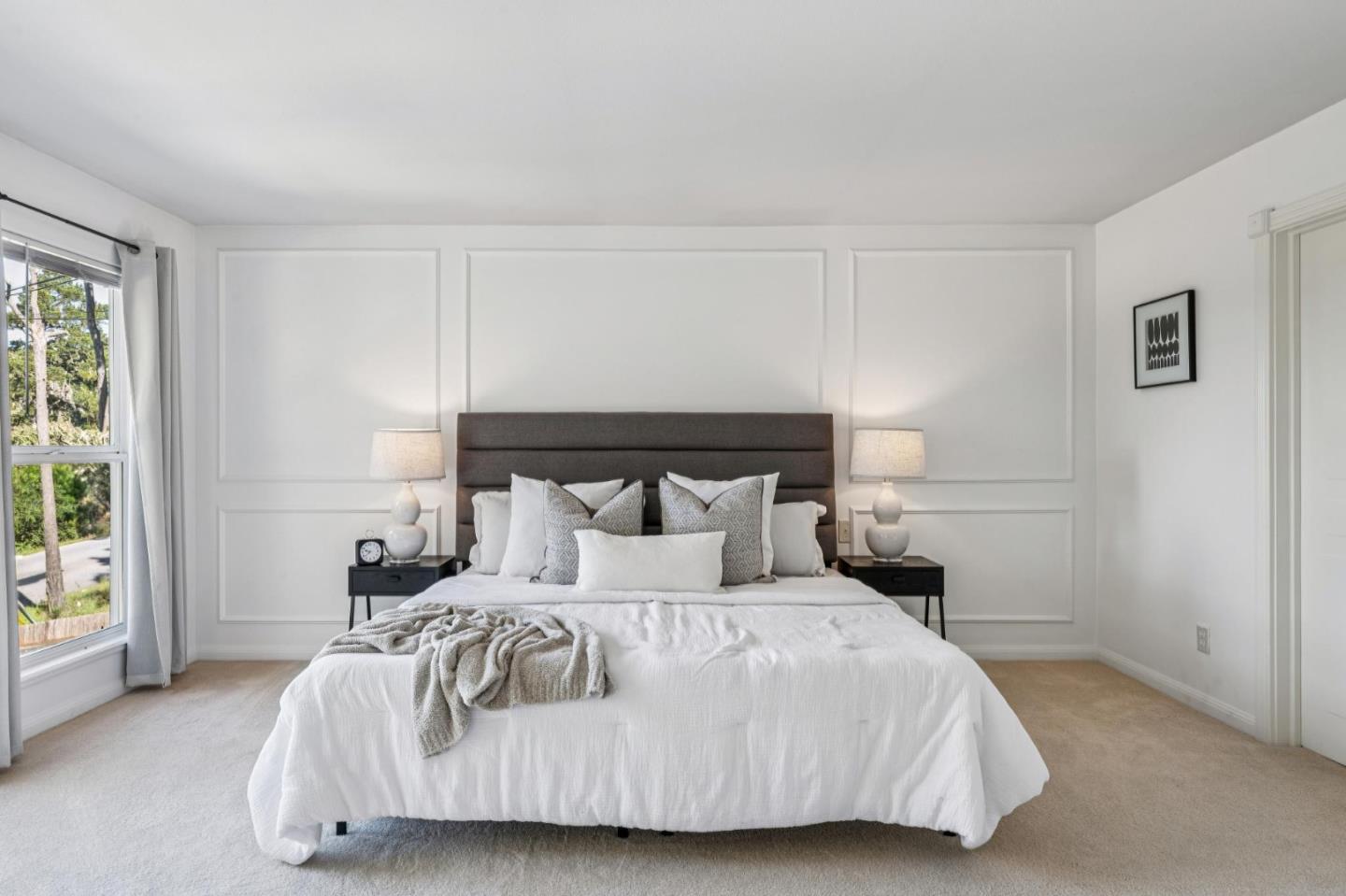 2905 Bird Rock Road Pebble Beach, CA 93953 - Photo 23 of 33 a bedroom with a bed and large window