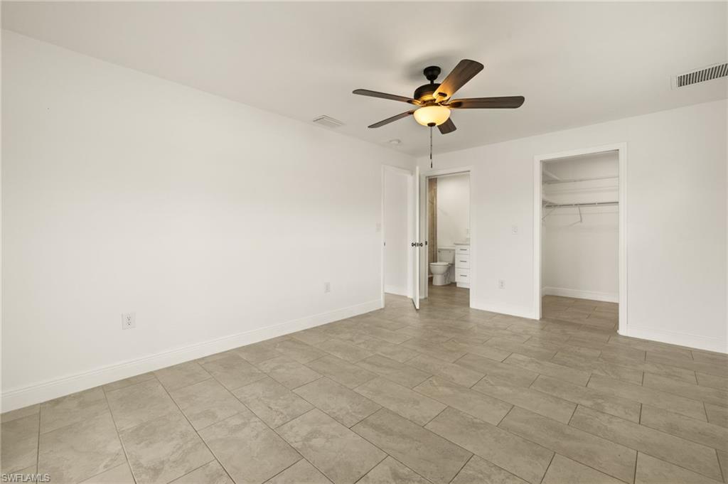 13846 Sleepy Hollow Lane Fort Myers, FL 33905 - Photo 18 of 46 a view of a livingroom with a ceiling fan and window
