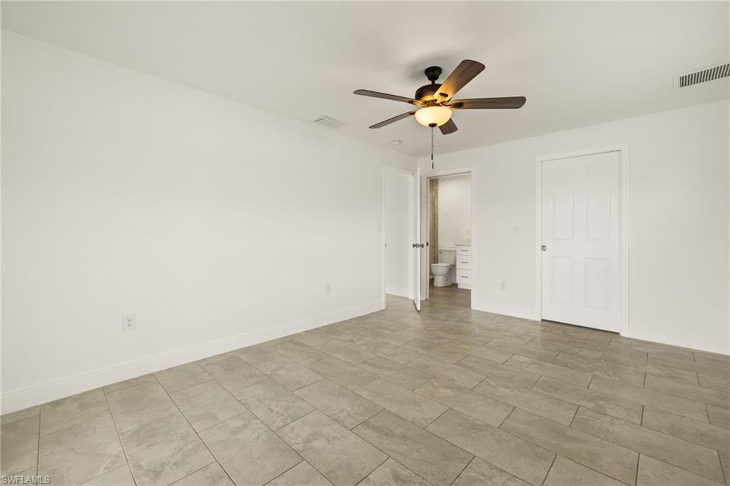 13846 Sleepy Hollow Lane Fort Myers, FL 33905 - Photo 19 of 46 a view of a chandelier fan