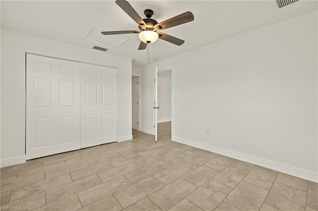 13846 Sleepy Hollow Lane Fort Myers, FL 33905 - Photo 23 of 46 an empty room with fan