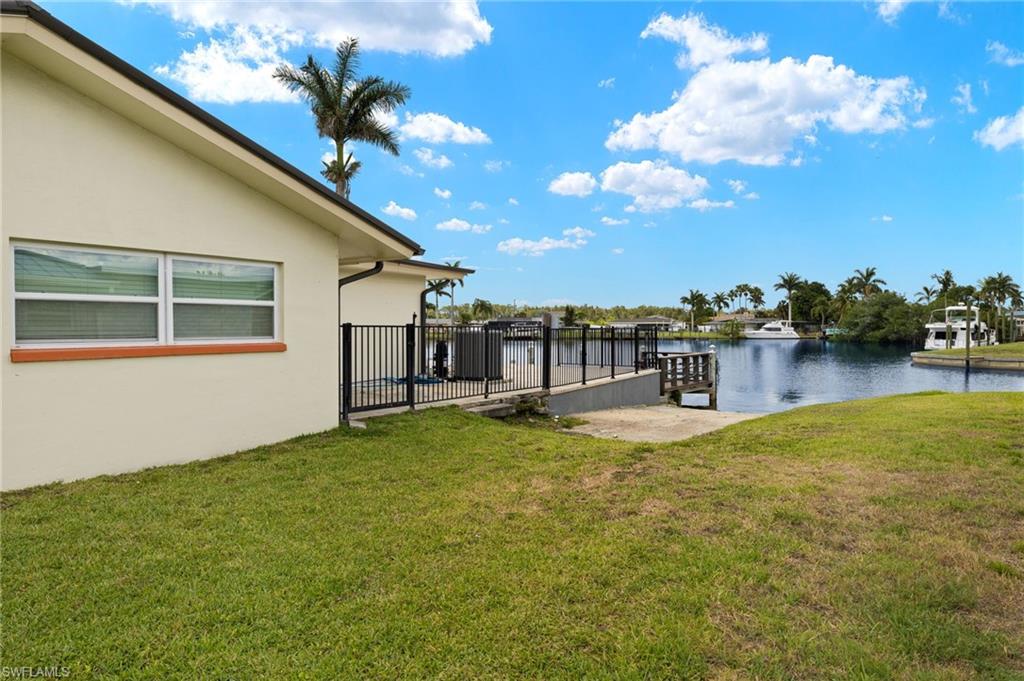 13846 Sleepy Hollow Lane Fort Myers, FL 33905 - Photo 32 of 46 a view of a house with backyard and sitting area