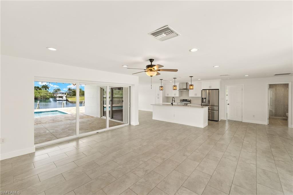 13846 Sleepy Hollow Lane Fort Myers, FL 33905 - Photo 36 of 46 a view of a kitchen with furniture and a kitchen