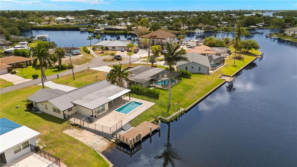 13846 Sleepy Hollow Lane Fort Myers, FL 33905 - Photo 38 of 46 an aerial view of a house with a ocean view