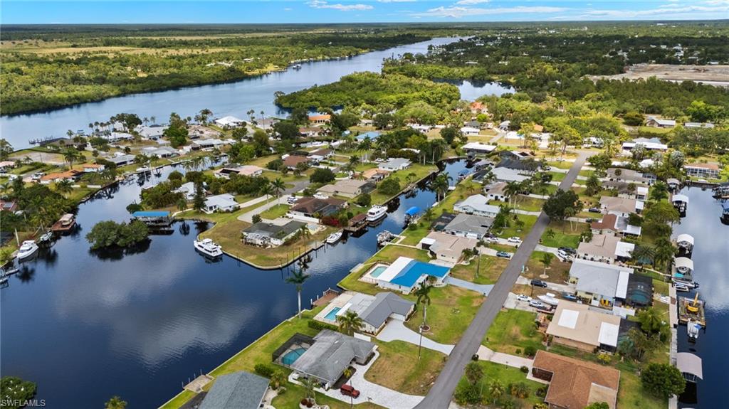 13846 Sleepy Hollow Lane Fort Myers, FL 33905 - Photo 42 of 46 an aerial view of residential houses with outdoor space