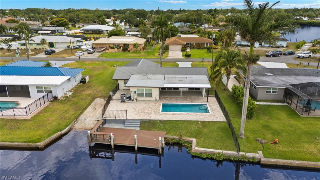 13846 Sleepy Hollow Lane Fort Myers, FL 33905 - Photo 43 of 46 a view of a city with lawn chairs