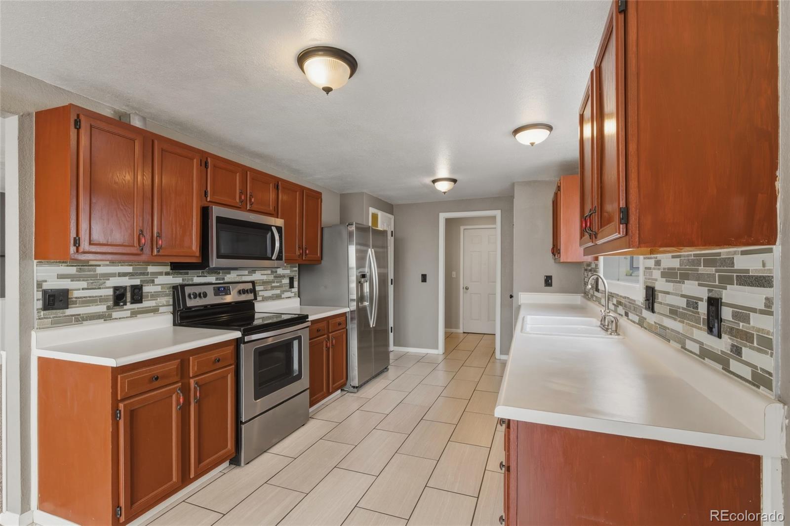 8026 Decatur Street Westminster, CO 80031 - Photo 12 of 31