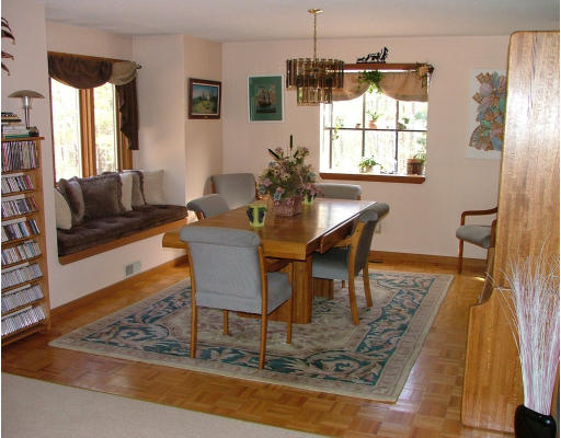 551 Reed Road Dartmouth, MA 02747 - Photo 3 of 5 a dining room with furniture window and wooden floor