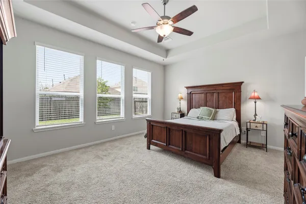 a bathroom with a sink double vanity and a mirror