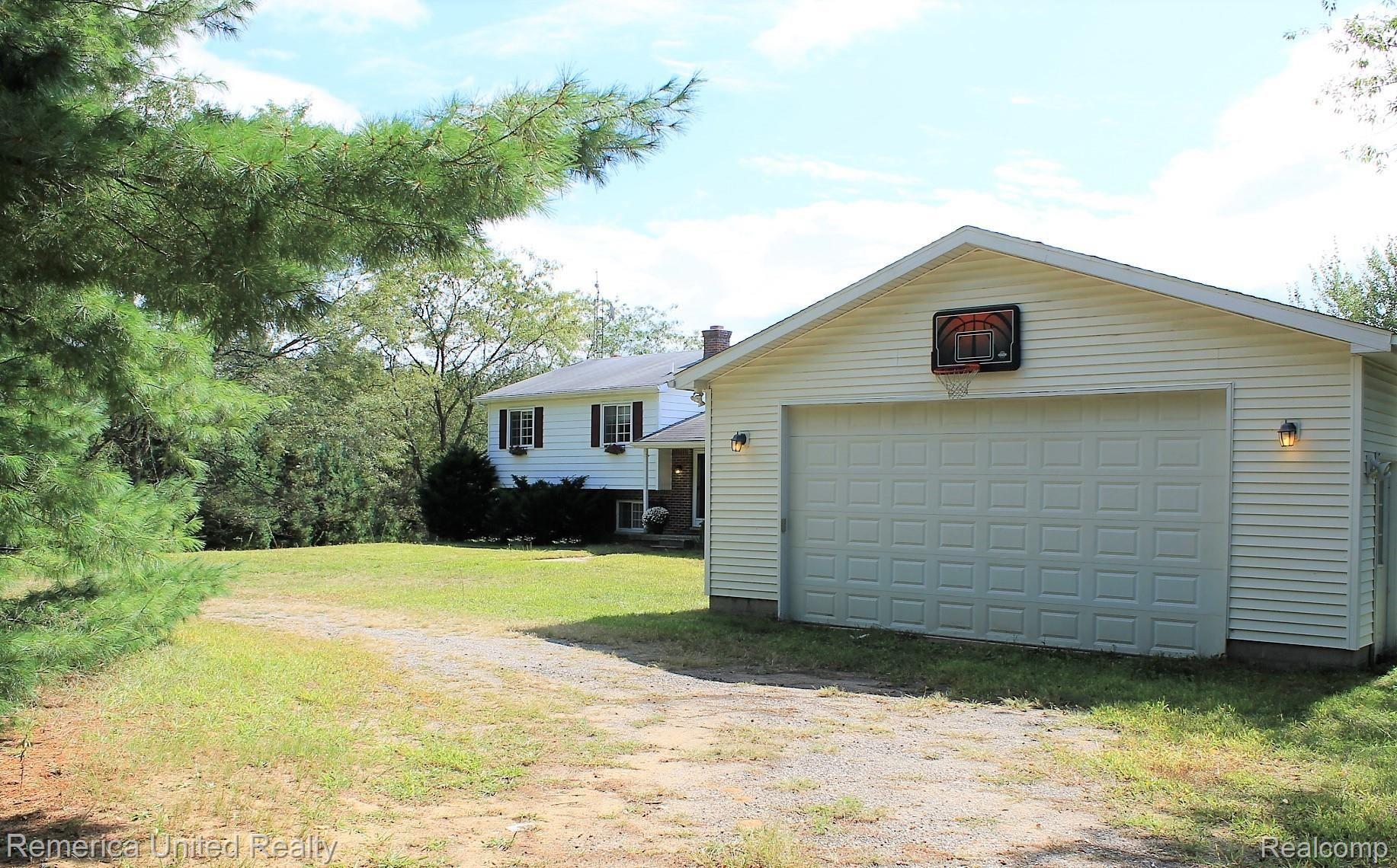 2007 Gannon Road Howell, MI 48855 - Photo 13 of 93 WebbRealtyPros_2007Gannon_ExteriorGarage.JPG