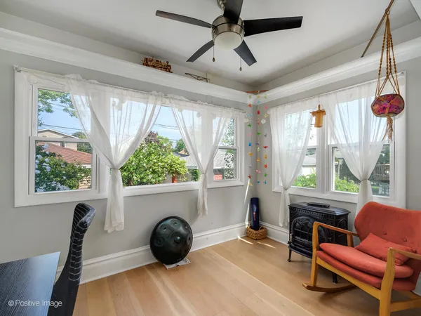 a room with furniture and a large window