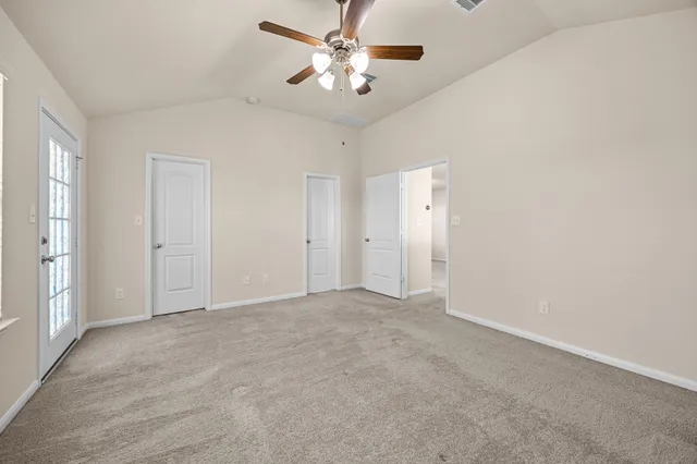 a bathroom with a sink double vanity granite tub shower and a mirror