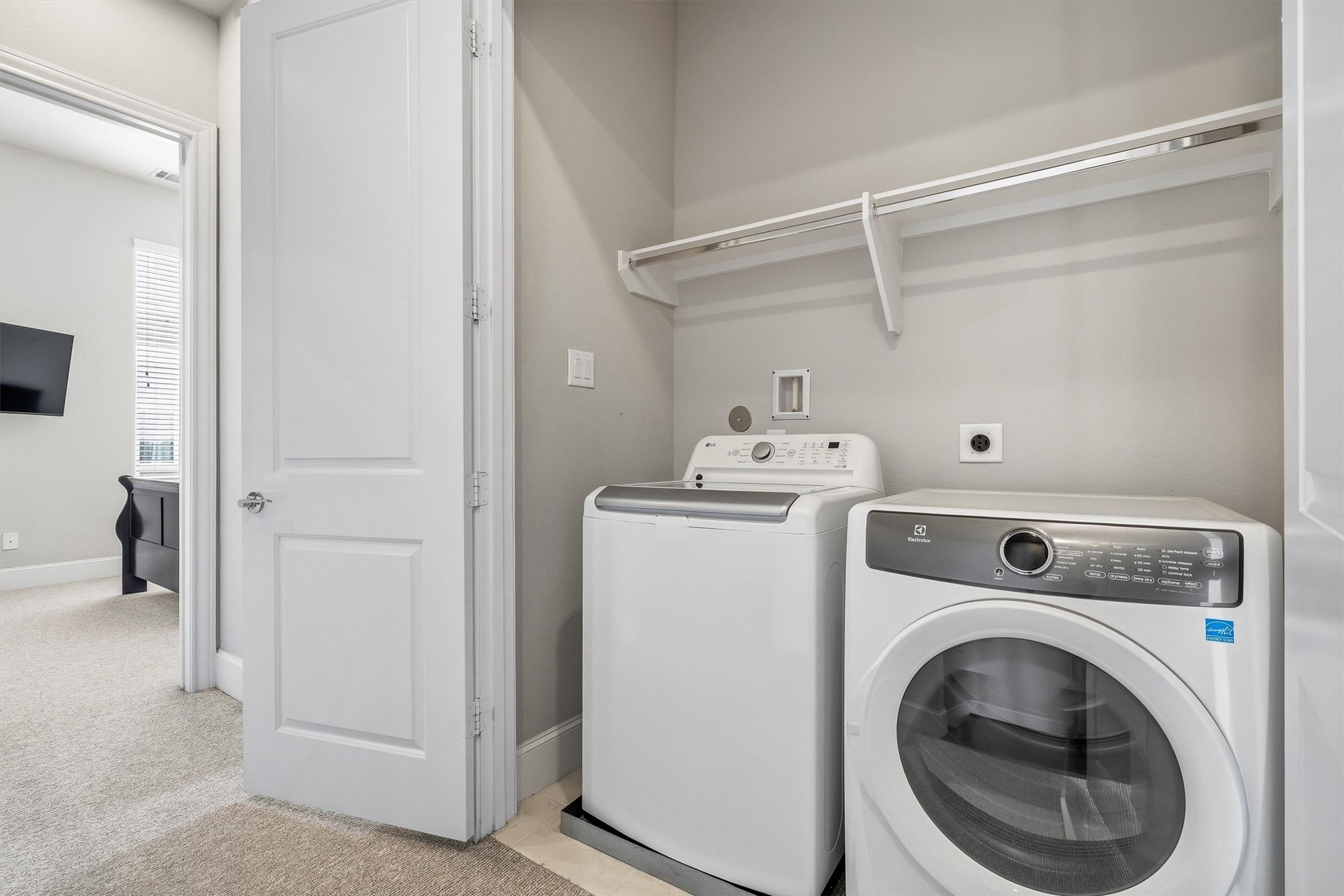 9614 Riddlewood Lane Houston, TX 77025 - Photo 17 of 23 a utility room with dryer and washer