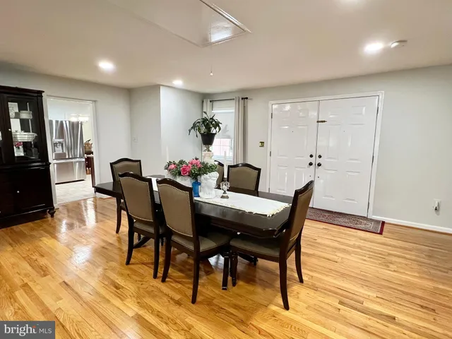 a kitchen with a sink stove top oven and cabinets