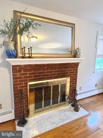 a bathroom with a granite countertop shower a toilet and a sink