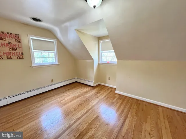 a view of a patio with table and chairs