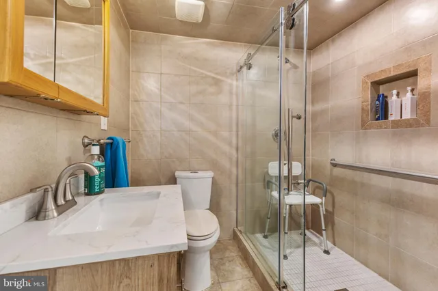 a couple of cars parked in front of a building