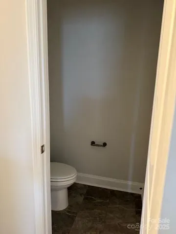 a bathroom with a toilet