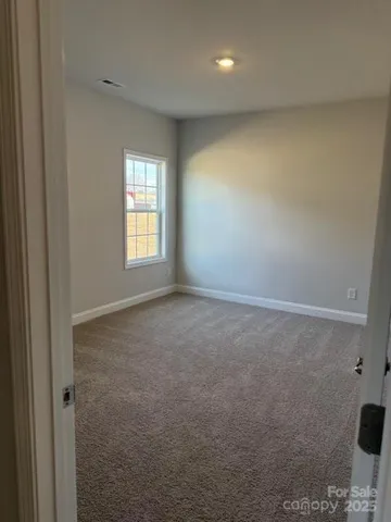 a view of a room that has a window in it