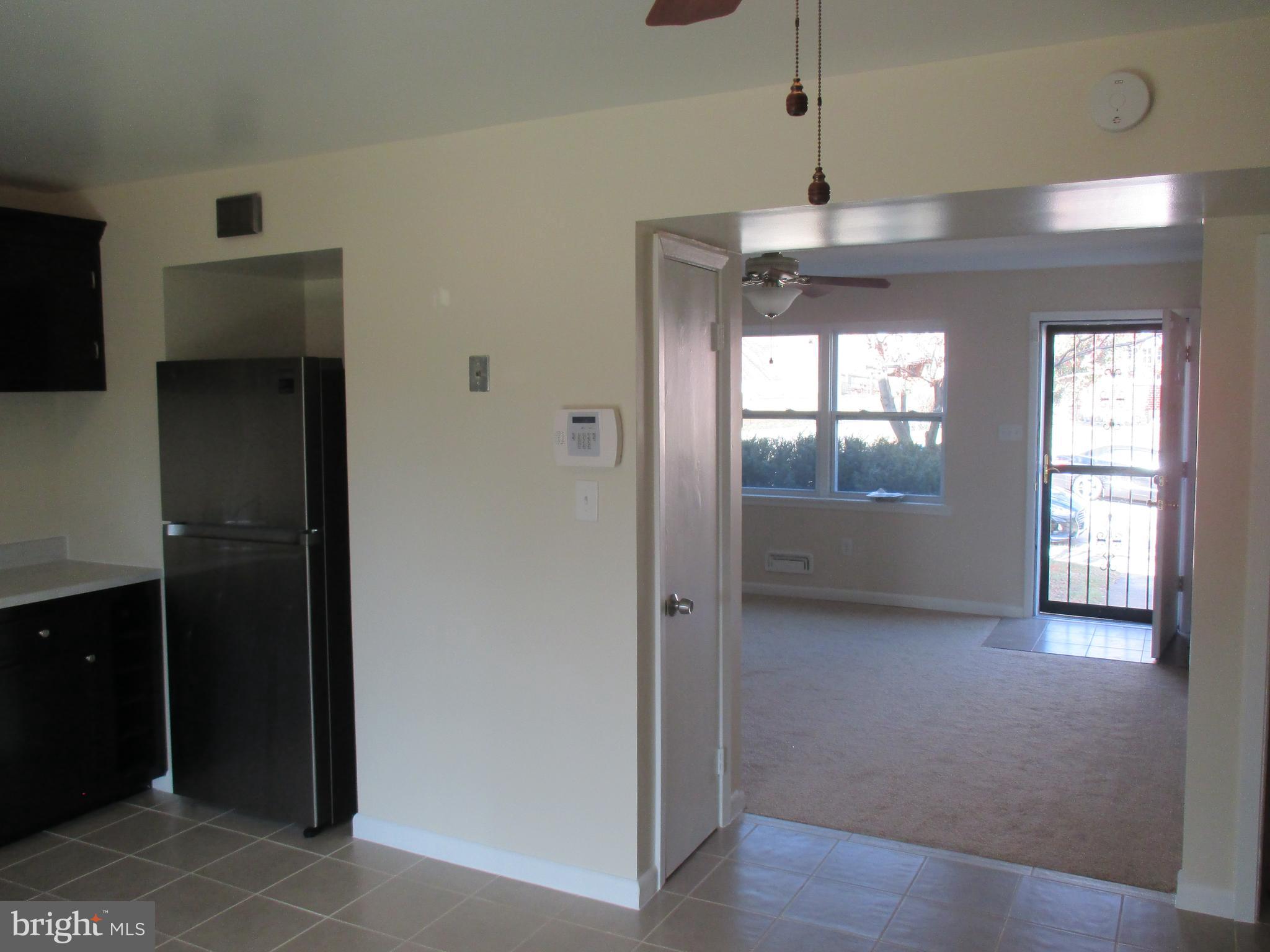 4713 Vancouver Road Baltimore, MD 21229 - Photo 22 of 31 Kitchen, Living Room, Front Door