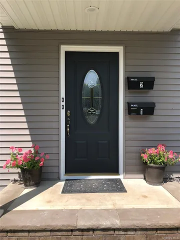 a house with a potted plant