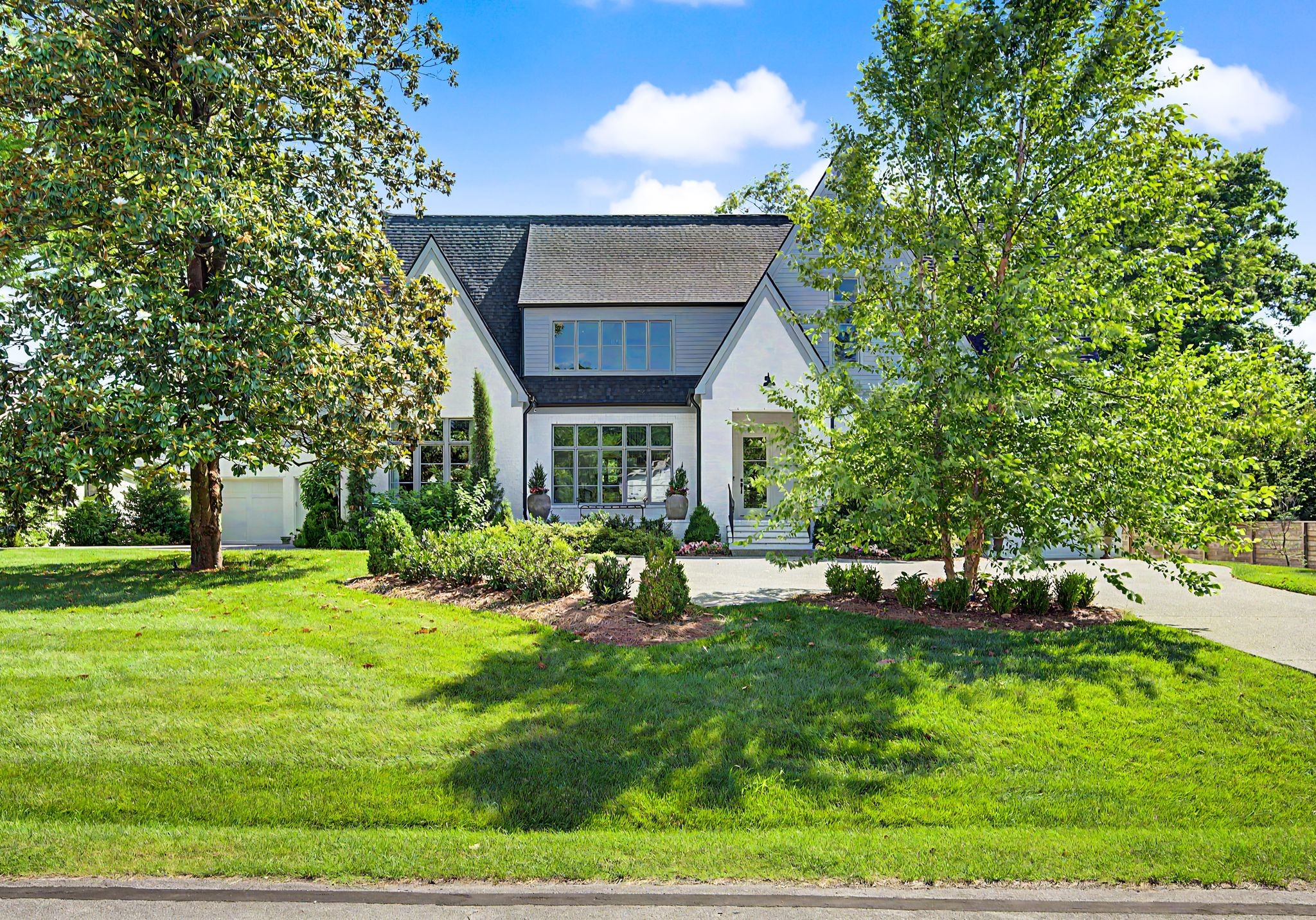 2825 Sugar Tree Road Nashville, TN 37215 - Photo 2 of 89 a view of an house with backyard space and garden