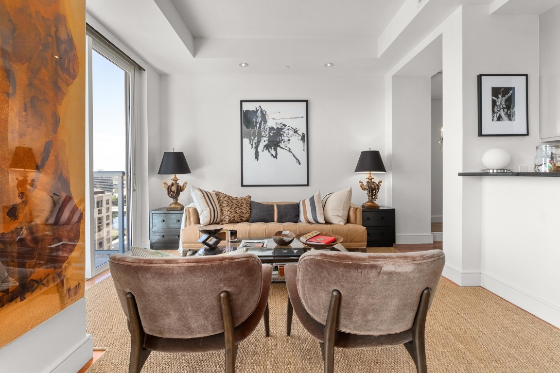 98 San Jacinto Boulevard, Unit 1201 Austin, TX 78701 - Photo 2 of 22 a dining room with furniture and window
