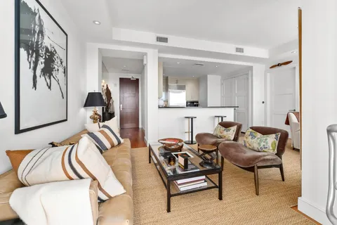 a view of livingroom with furniture and window