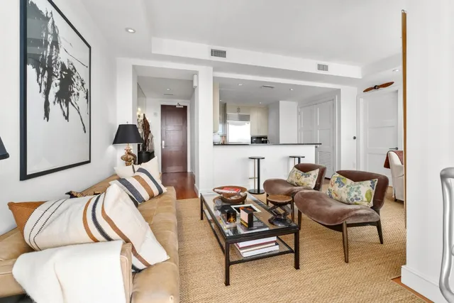 a view of livingroom with furniture and window