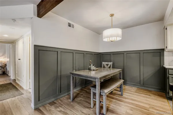 a room with a table and chairs