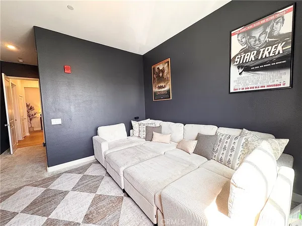 a living room with a bed and a couch