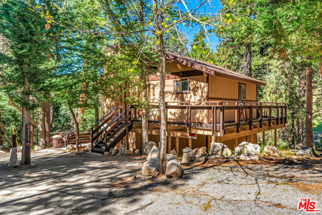2378 Rim Of The World Drive Running Springs, CA 92382 - Photo 2 of 33 a view of a house with a tree