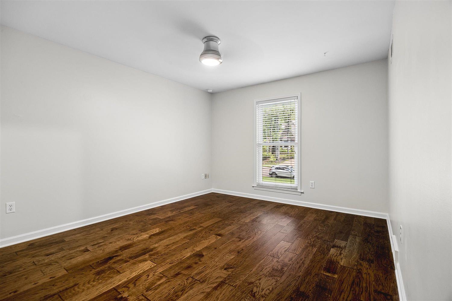 8970 Farmoor Road Germantown, TN 38139 - Photo 19 of 35 Hardwood flooring in a rich brown finish