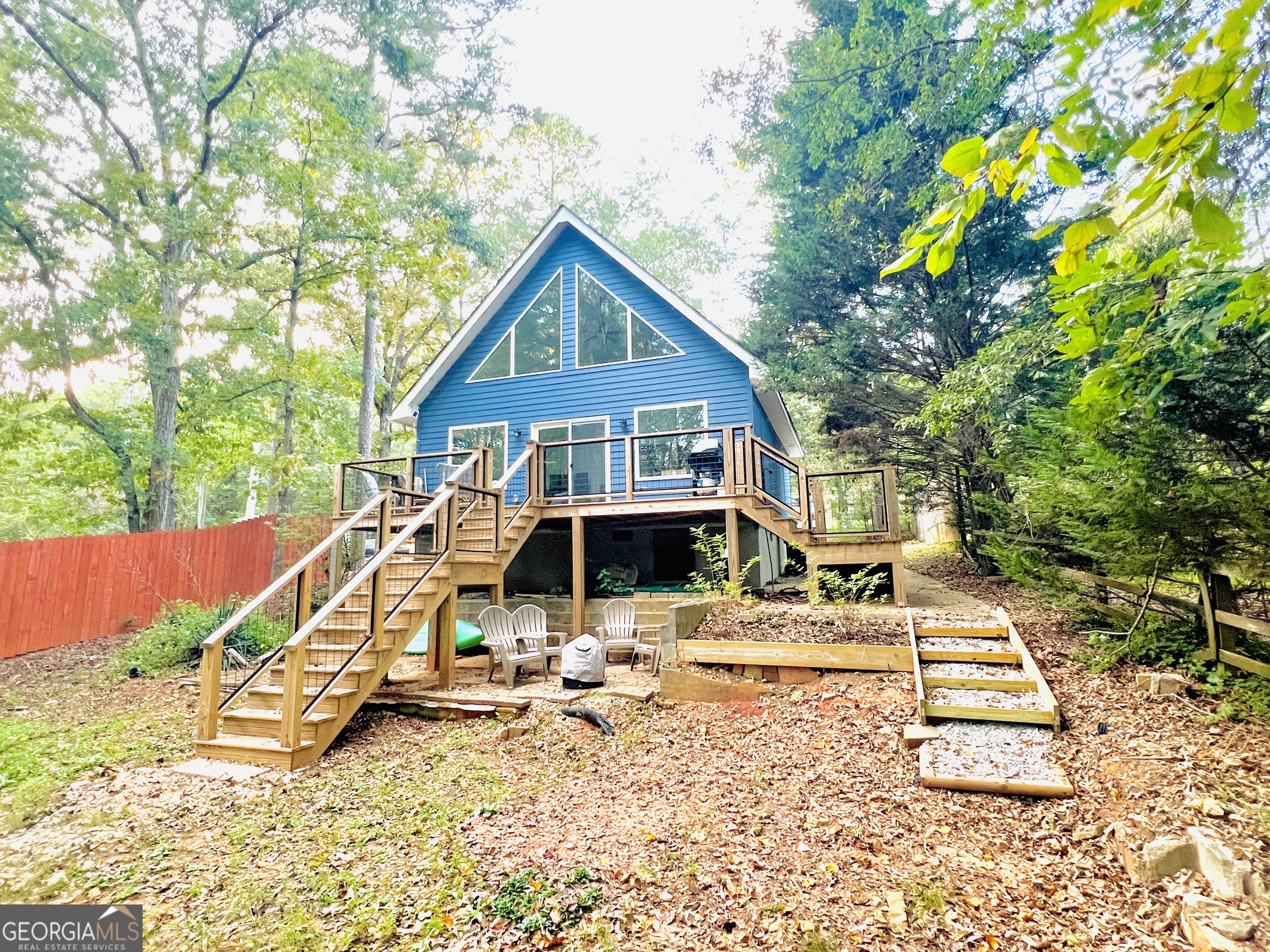 788 Lakeshore Road Martin, GA 30557 - Photo 3 of 29 a view of a house with backyard porch and sitting area