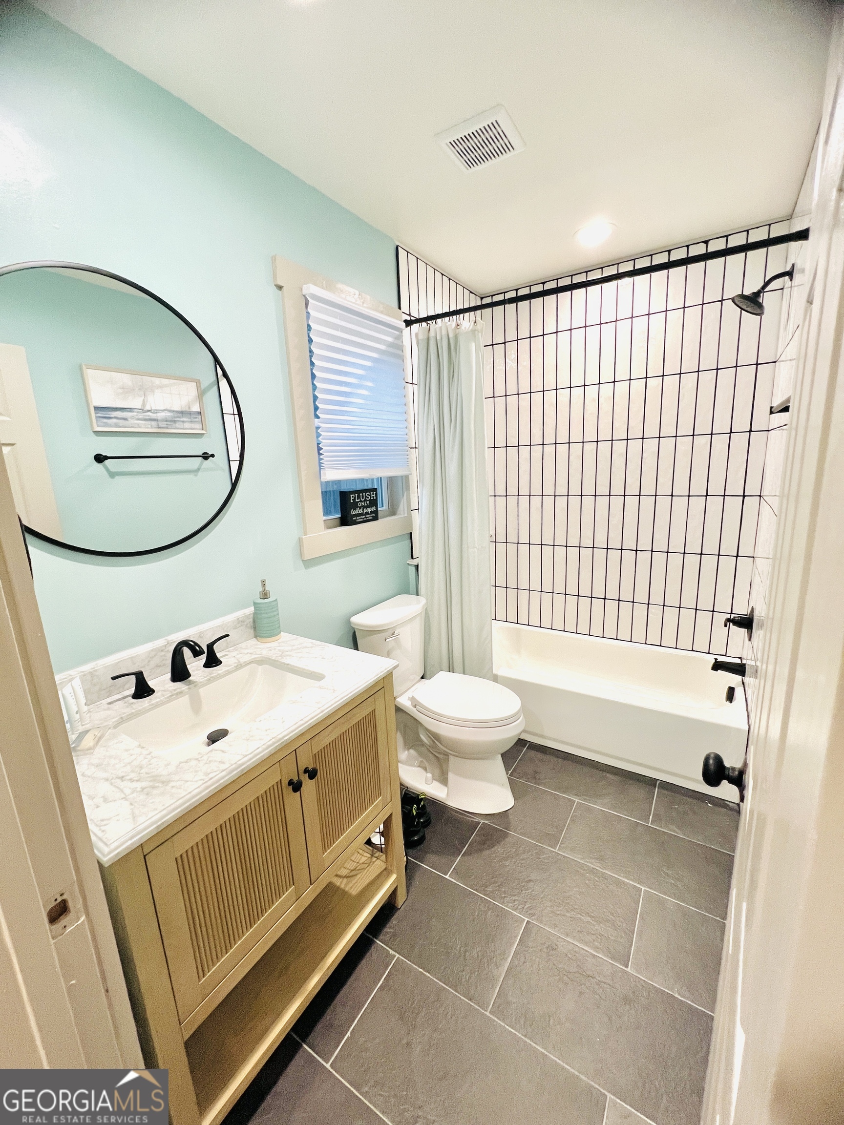 788 Lakeshore Road Martin, GA 30557 - Photo 7 of 29 a bathroom with a sink toilet and shower