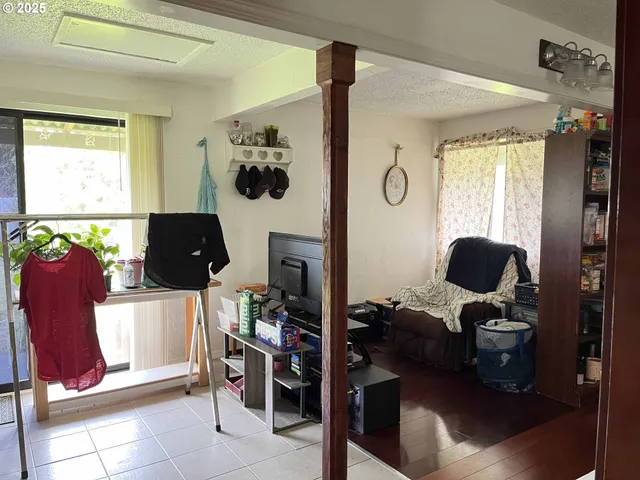a view of workspace with a window and gym equipment