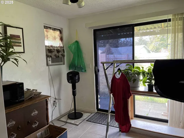 a view of entryway with wooden floor