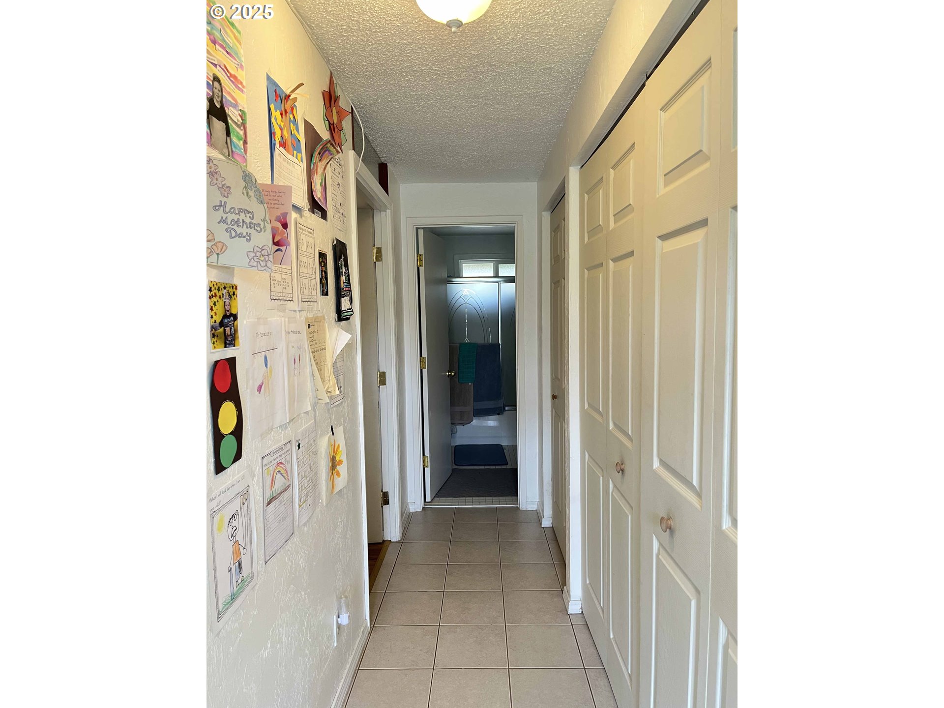 2385 19th Street Florence, OR 97439 - Photo 18 of 47 a view of a hallway with wooden cabinets