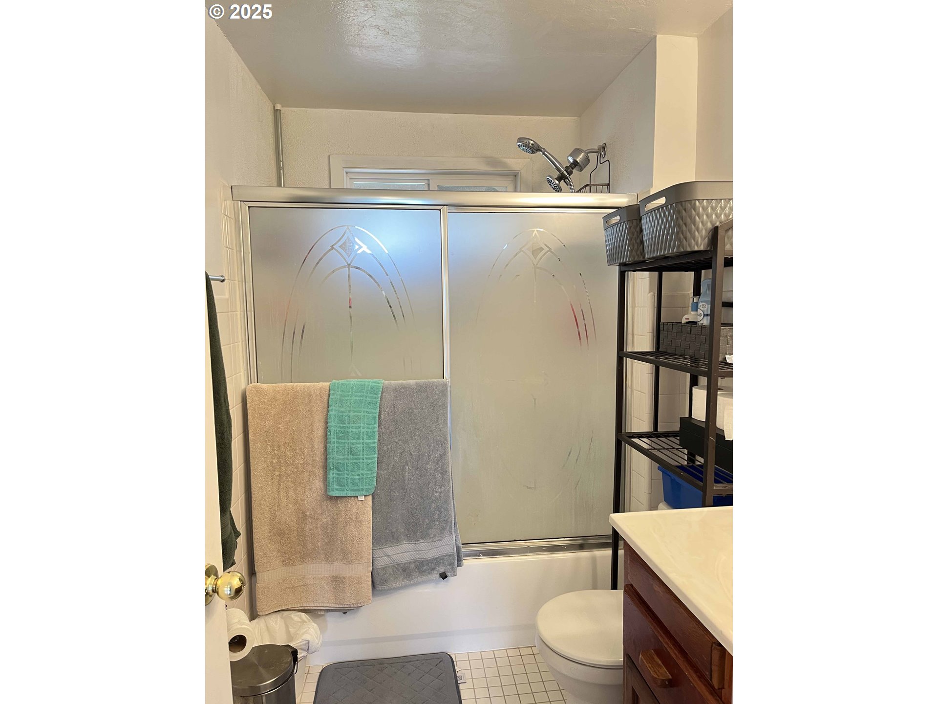 2385 19th Street Florence, OR 97439 - Photo 21 of 47 a bathroom with a sink toilet and shower