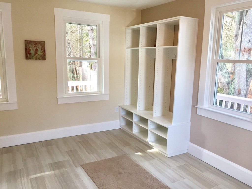 144 Pleasant Street Raynham, MA 02767 - Photo 26 of 29 a view of an empty room with a window